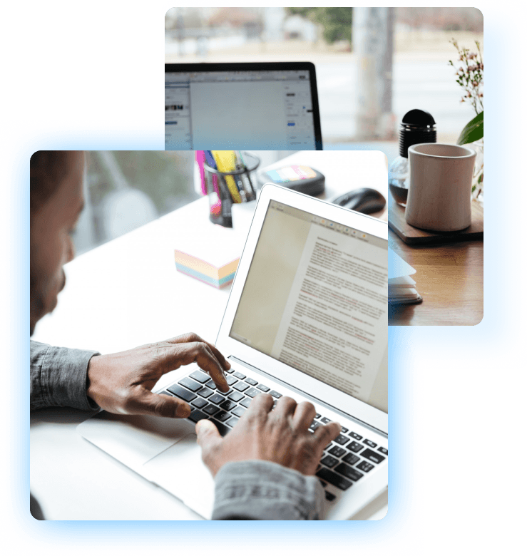 person typing in a laptop